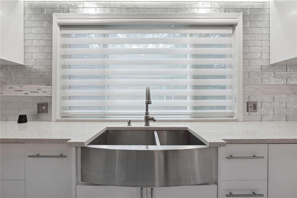 3149 Lakeview Parkway Villa Rica, GA 30180 - Photo 8 of 29 a kitchen with a sink and cabinets