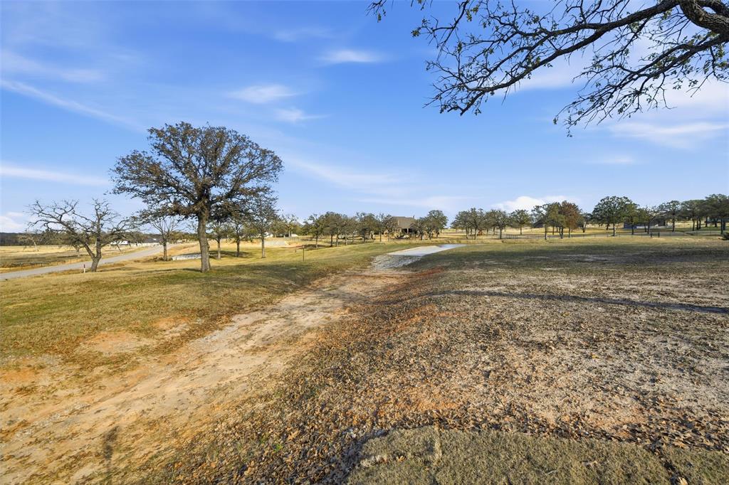 154 Rio Rancho Drive Decatur, TX 76234 - Photo 11 of 16 a view of an ocean with a building in the background