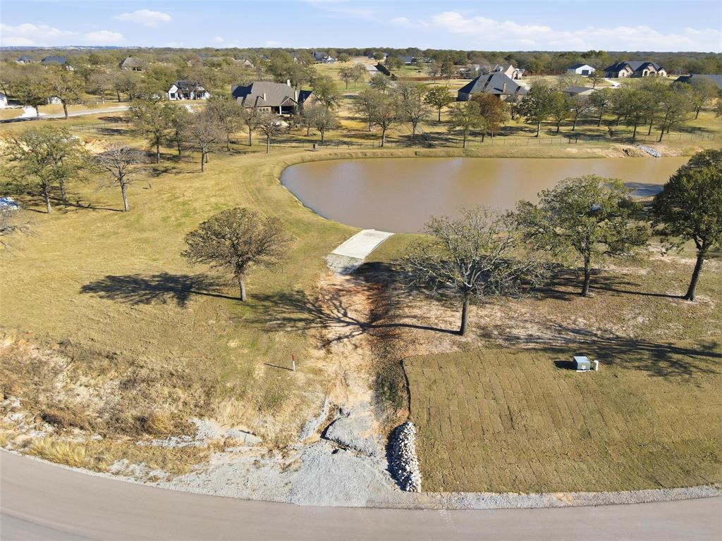 154 Rio Rancho Drive Decatur, TX 76234 - Photo 14 of 16 a view of a lake with a mountain