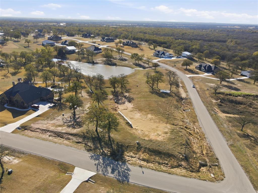 154 Rio Rancho Drive Decatur, TX 76234 - Photo 6 of 16 an aerial view of residential houses with outdoor space