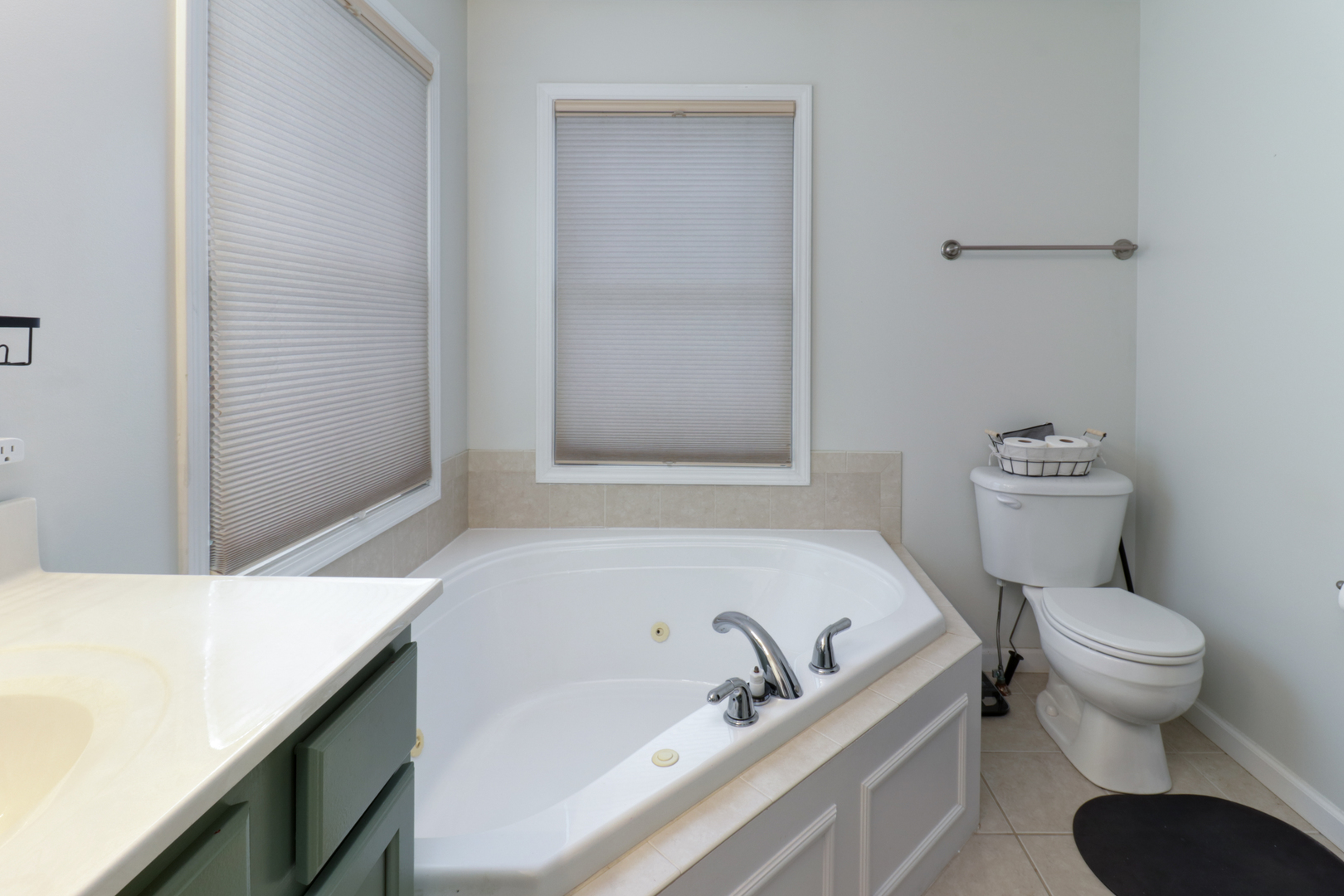 3283 Marimarsh Lane Normal, IL 61761 - Photo 16 of 28 a bathroom with a bathtub and a toilet