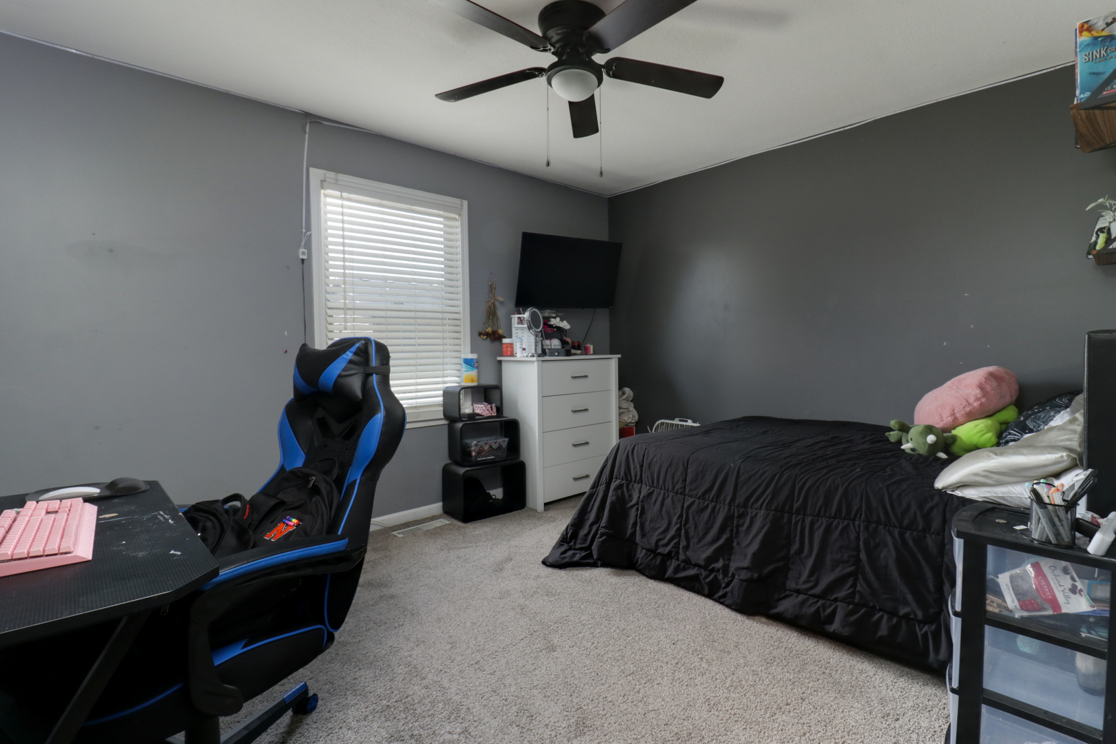 3283 Marimarsh Lane Normal, IL 61761 - Photo 17 of 28 a bedroom with a bed and a flat screen tv