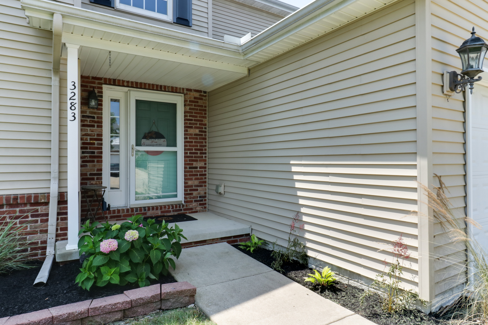 3283 Marimarsh Lane Normal, IL 61761 - Photo 2 of 28 a front view of a house with plants