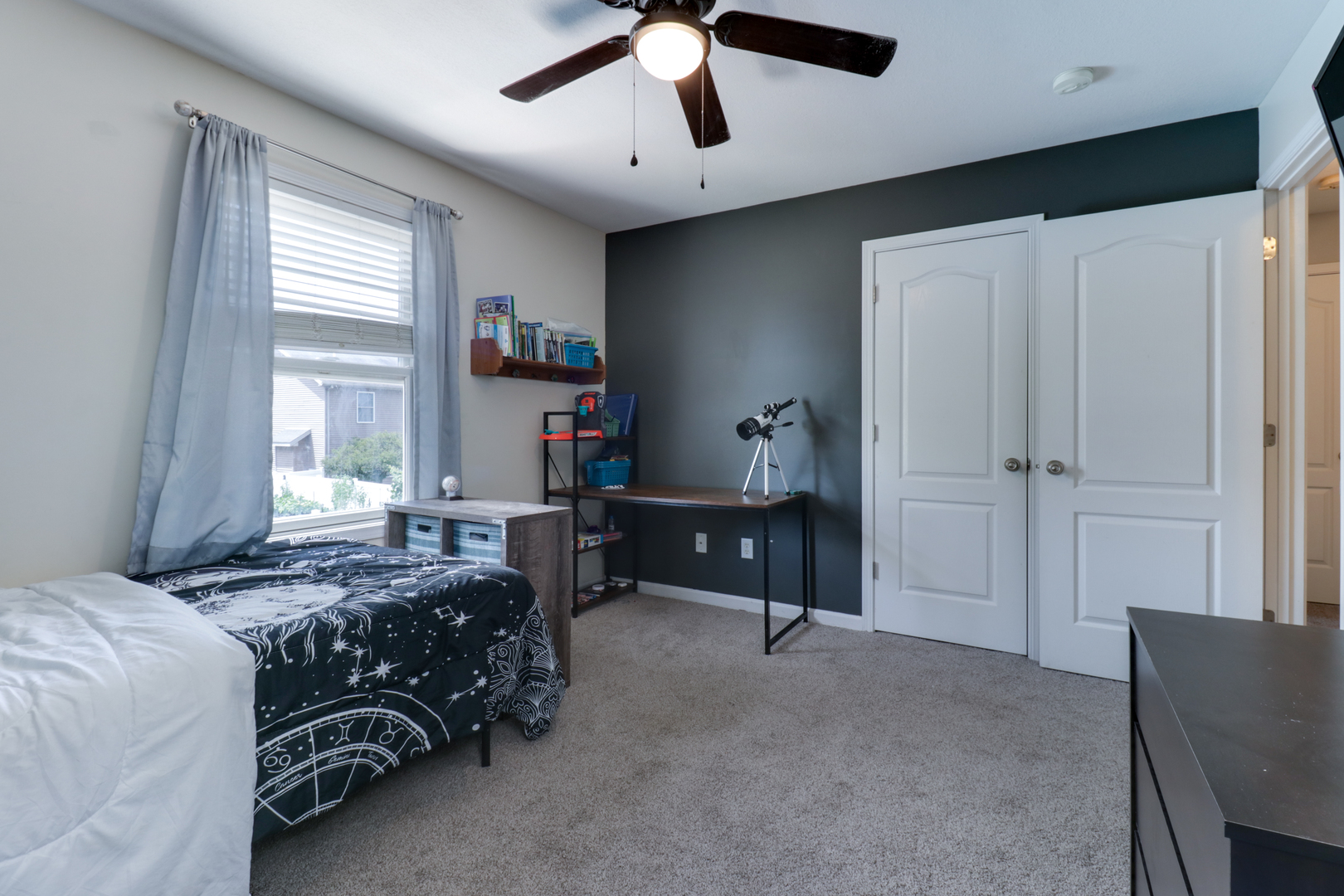 3283 Marimarsh Lane Normal, IL 61761 - Photo 21 of 28 a bedroom with a bed and a chandelier