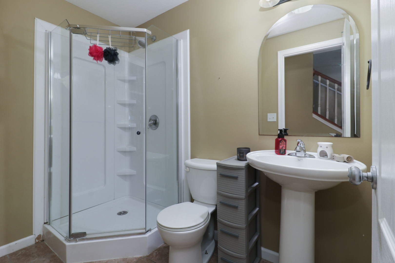 3283 Marimarsh Lane Normal, IL 61761 - Photo 24 of 28 a bathroom with a sink toilet and shower