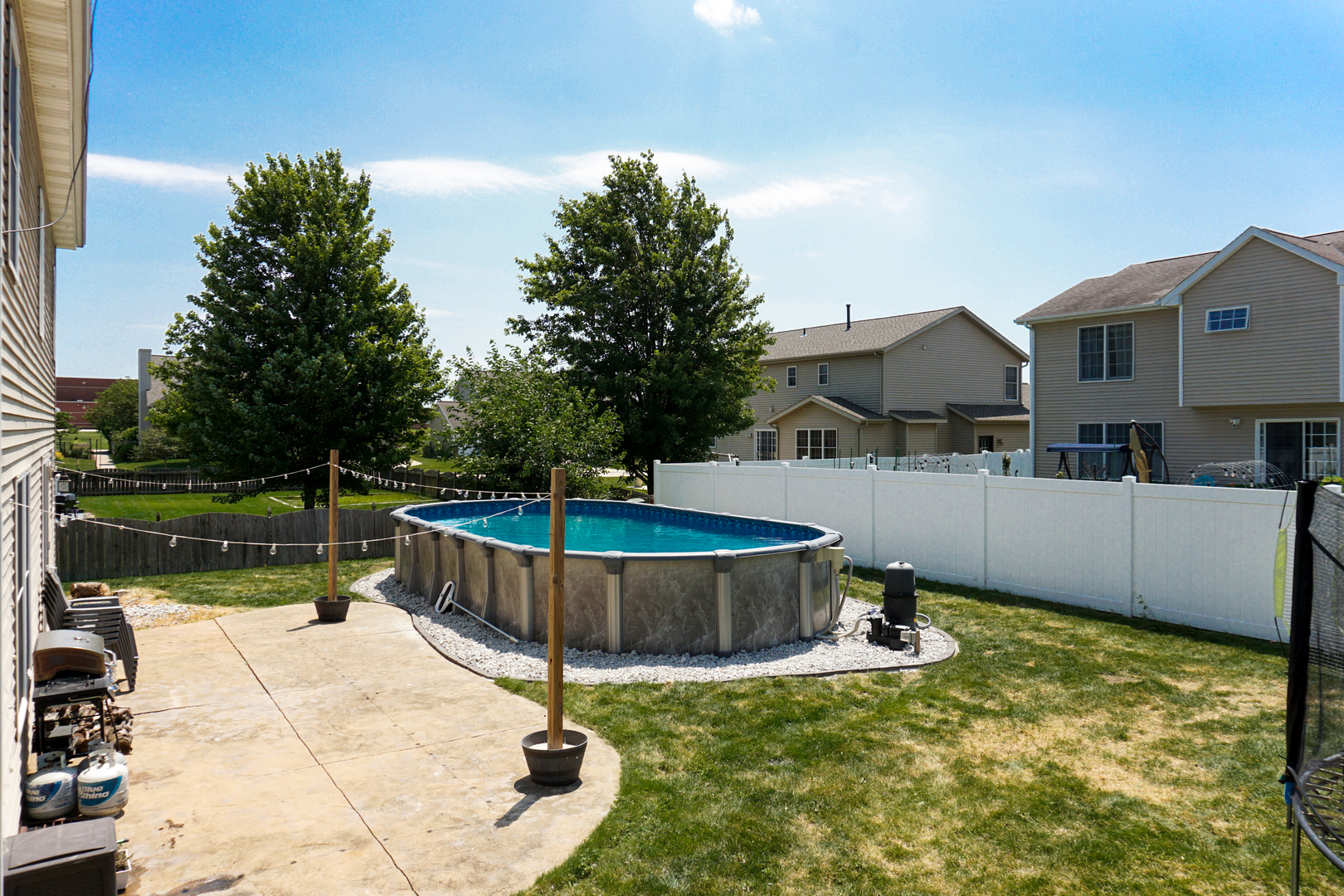 3283 Marimarsh Lane Normal, IL 61761 - Photo 27 of 28 a view of a swimming pool with a patio
