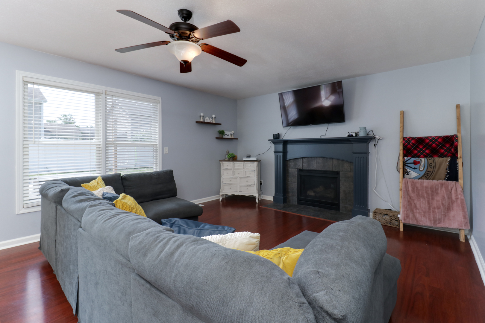 3283 Marimarsh Lane Normal, IL 61761 - Photo 4 of 28 a living room with furniture and a fireplace