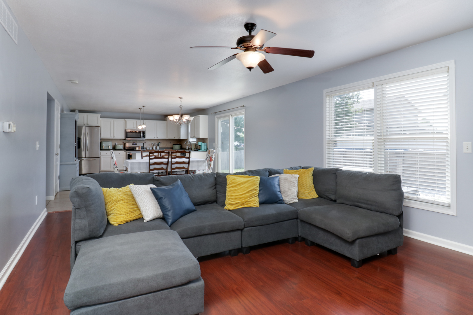 3283 Marimarsh Lane Normal, IL 61761 - Photo 8 of 28 a living room with furniture and kitchen view
