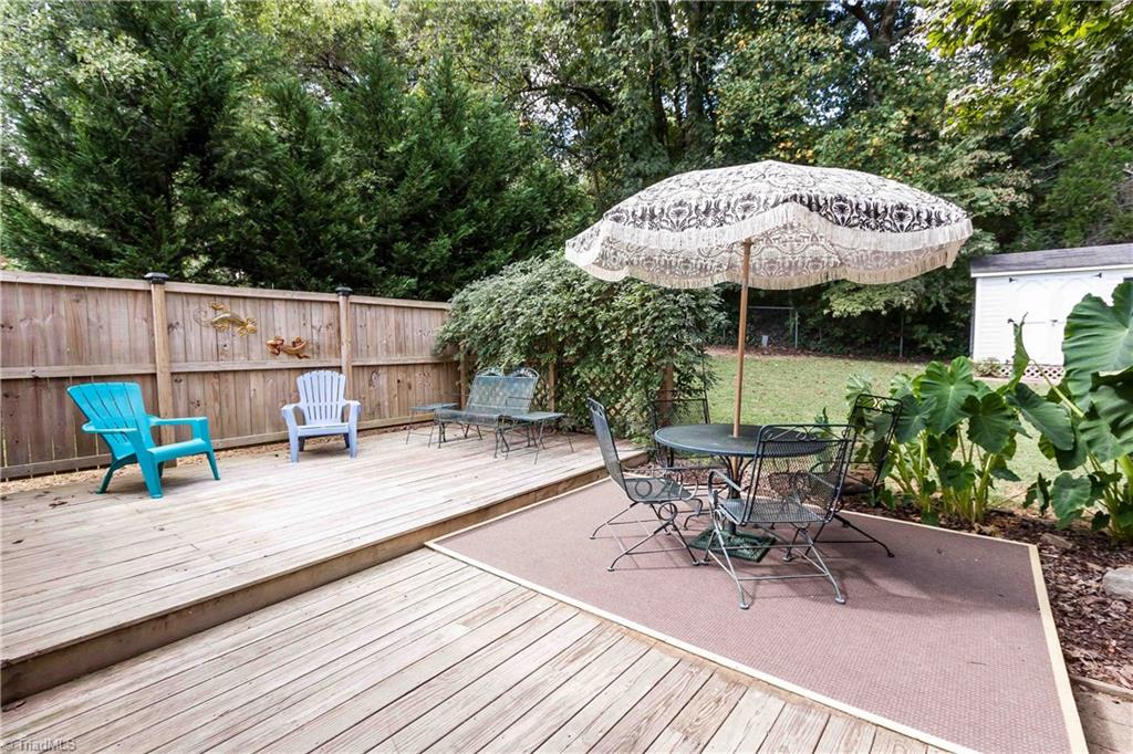 3102 Spring Mill Road Greensboro, NC 27406 - Photo 21 of 27 Privacy plus defined, manicured outdoor 'rooms' make this home special!
