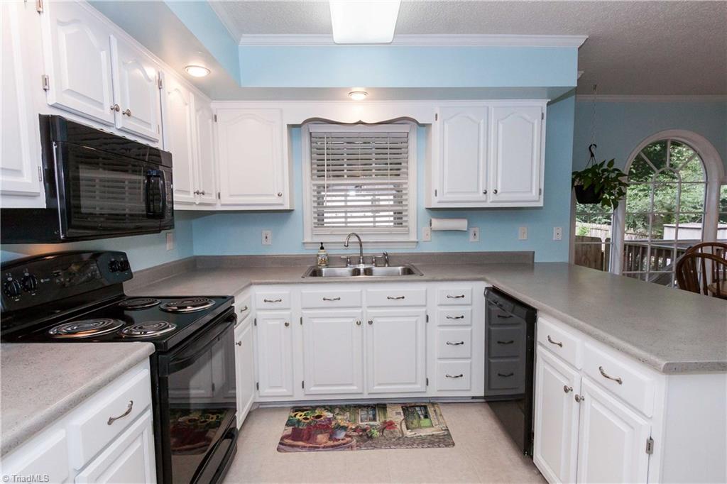 3102 Spring Mill Road Greensboro, NC 27406 - Photo 6 of 27 Freshly painted and professionally cleaned, this home is move in ready!