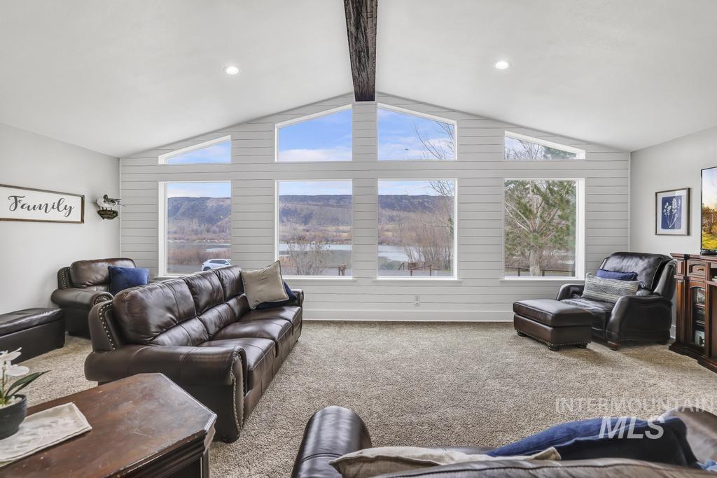 1785 River Road Buhl, ID 83316 - Photo 16 of 41 Living area with carpet floors and recessed lighting