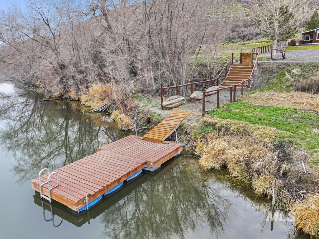 1785 River Road Buhl, ID 83316 - Photo 2 of 41 Dock area featuring a water view and view of scattered trees