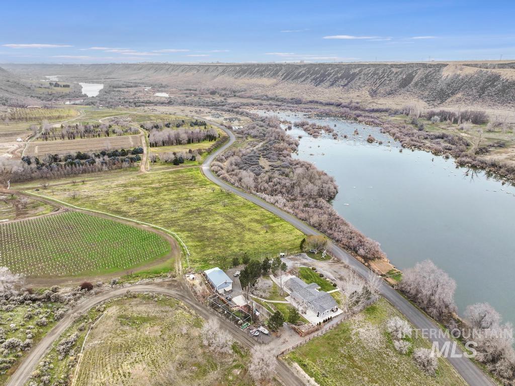 1785 River Road Buhl, ID 83316 - Photo 41 of 41 Aerial view of sparsely populated area featuring large plots for crops and a large body of water