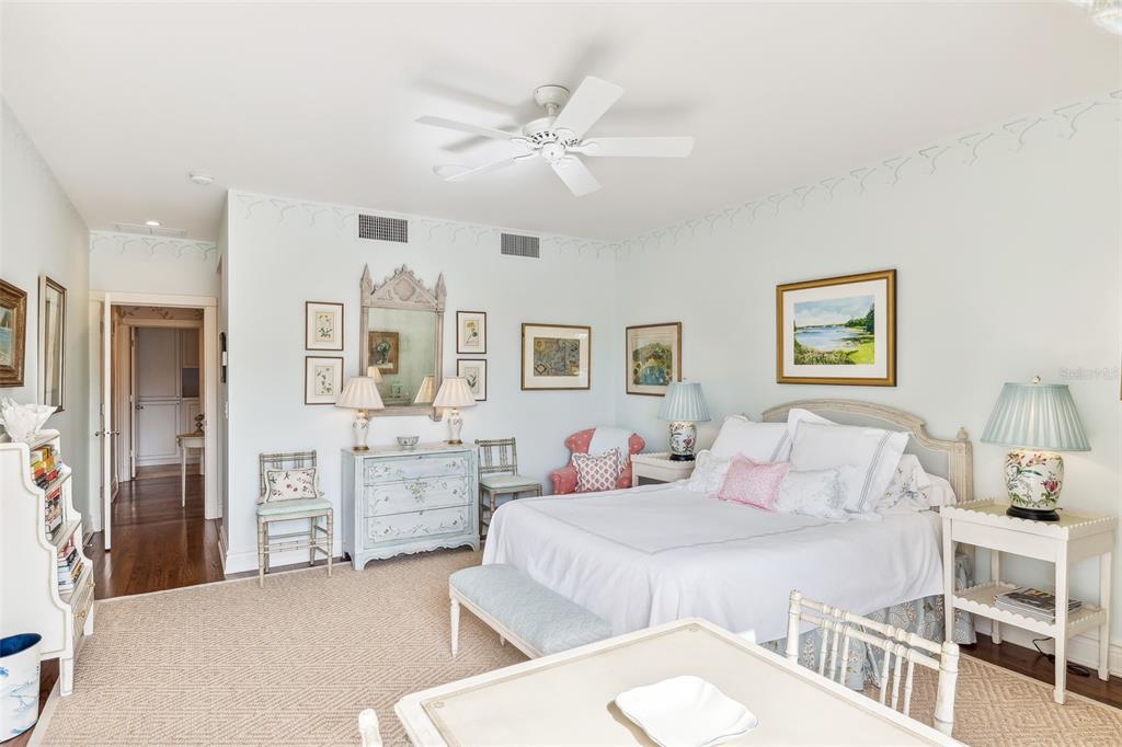 160 Sheep Shank Court Boca Grande, FL 33921 - Photo 13 of 36 a bedroom with a bed and ceiling fan
