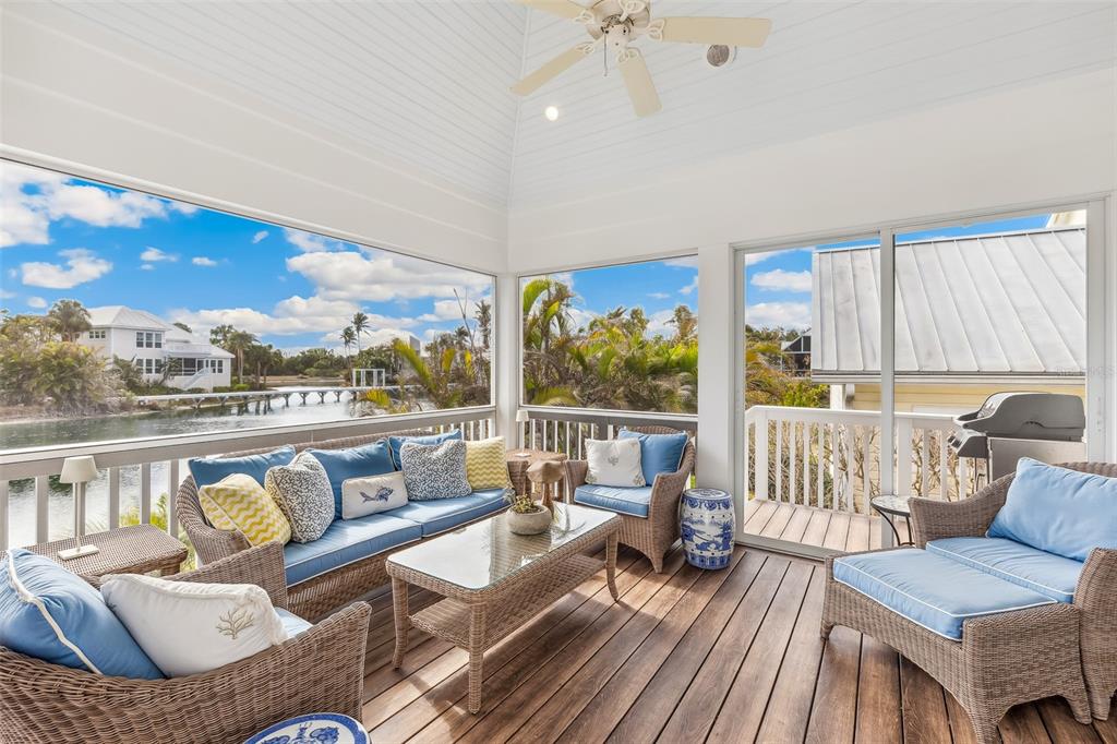 160 Sheep Shank Court Boca Grande, FL 33921 - Photo 16 of 36 a living room with furniture and a large window
