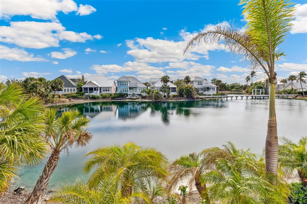 160 Sheep Shank Court Boca Grande, FL 33921 - Photo 18 of 36 a view of a lake with houses in the back
