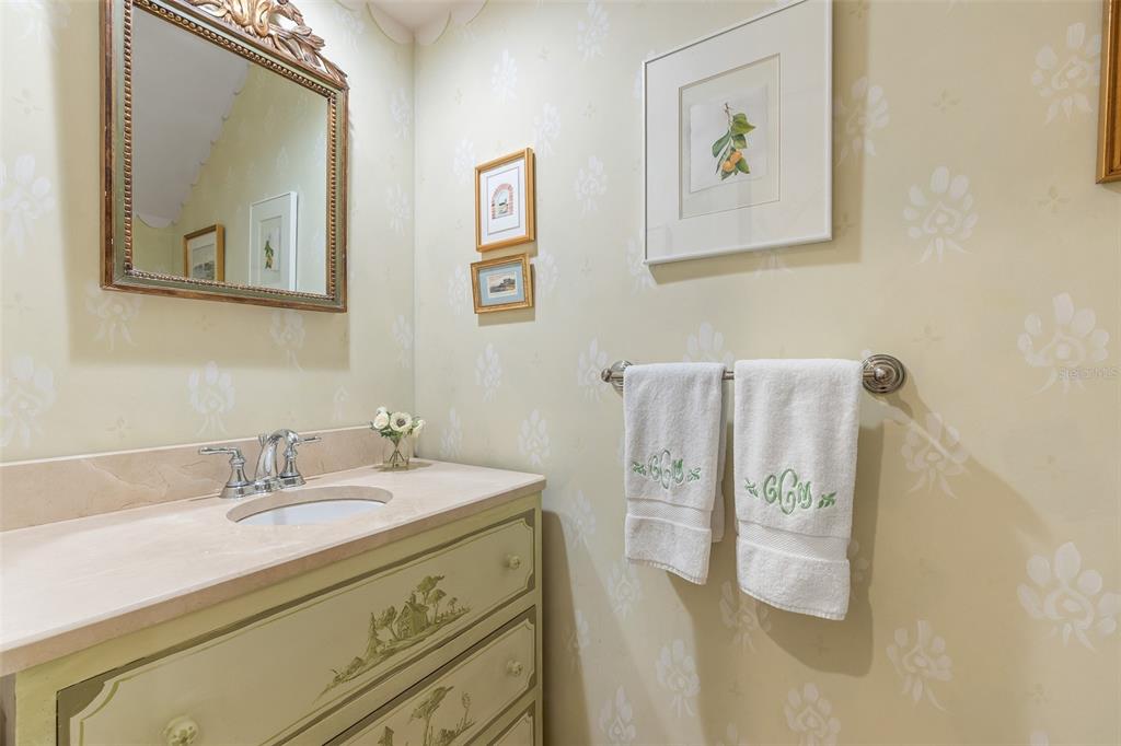 160 Sheep Shank Court Boca Grande, FL 33921 - Photo 19 of 36 a bathroom with a sink mirror and vanity