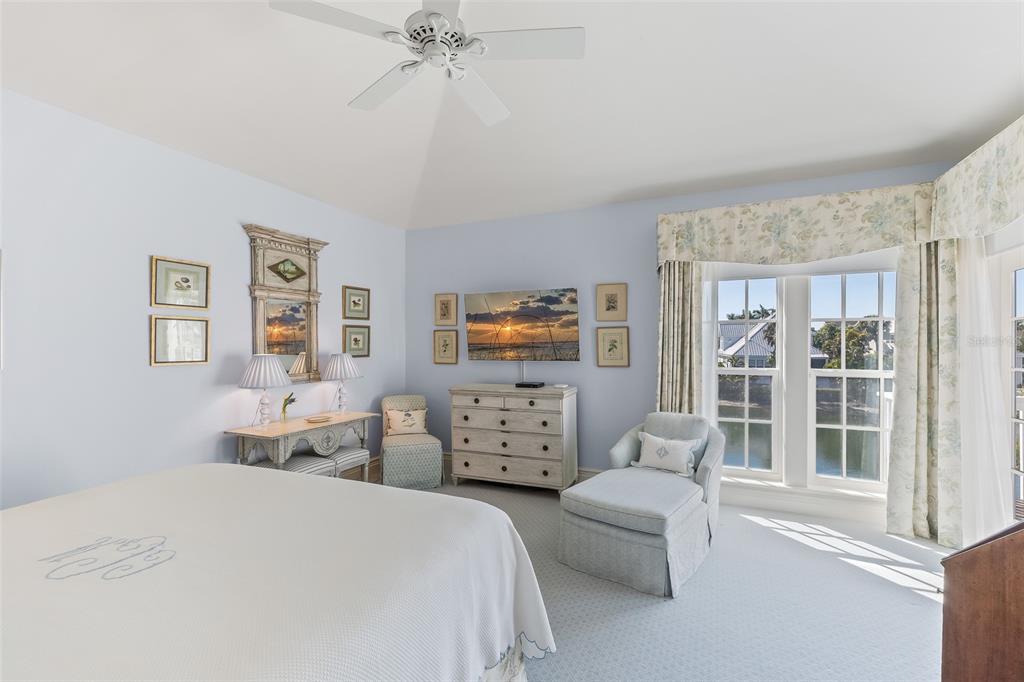 160 Sheep Shank Court Boca Grande, FL 33921 - Photo 22 of 36 a bedroom with two beds and a large window