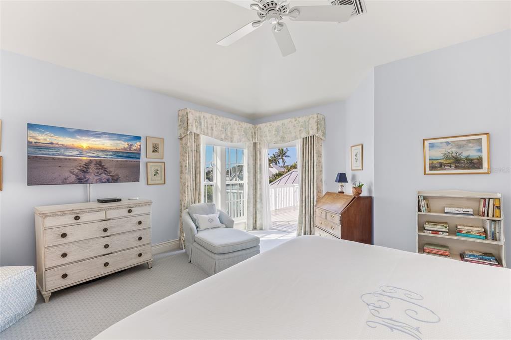 160 Sheep Shank Court Boca Grande, FL 33921 - Photo 23 of 36 a bedroom with a bed and dresser