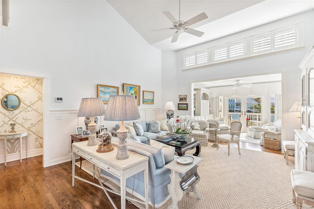 160 Sheep Shank Court Boca Grande, FL 33921 - Photo 3 of 36 a living room with furniture a large window and a table