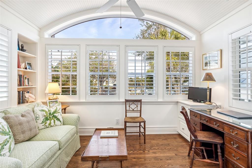 160 Sheep Shank Court Boca Grande, FL 33921 - Photo 7 of 36 a living room with furniture a table and a large window