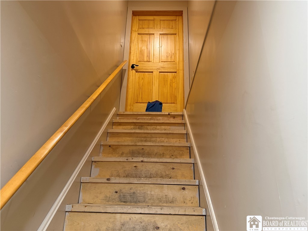9039 Kidder Road Mina, NY 14781 - Photo 37 of 48 Stairs to the garage and utility area