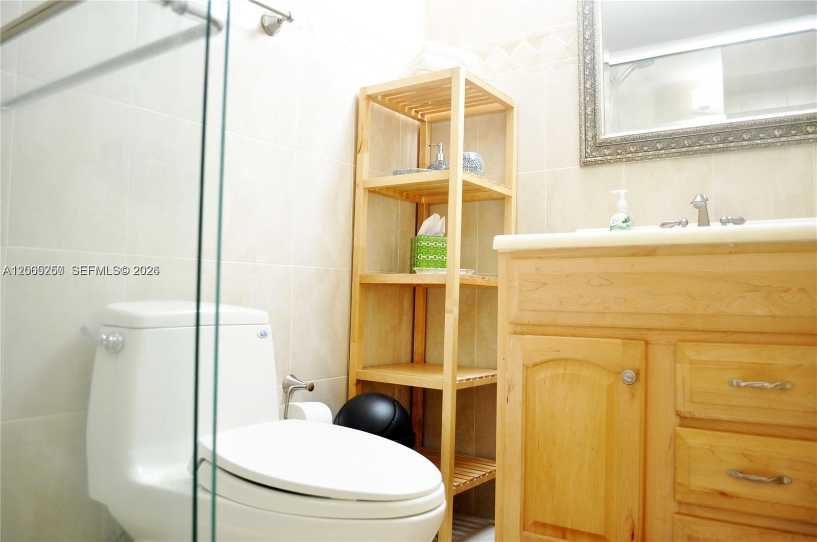 100 Lincoln Road, Unit 534 Miami Beach, FL 33139 - Photo 11 of 15 a bathroom with a toilet and a shower