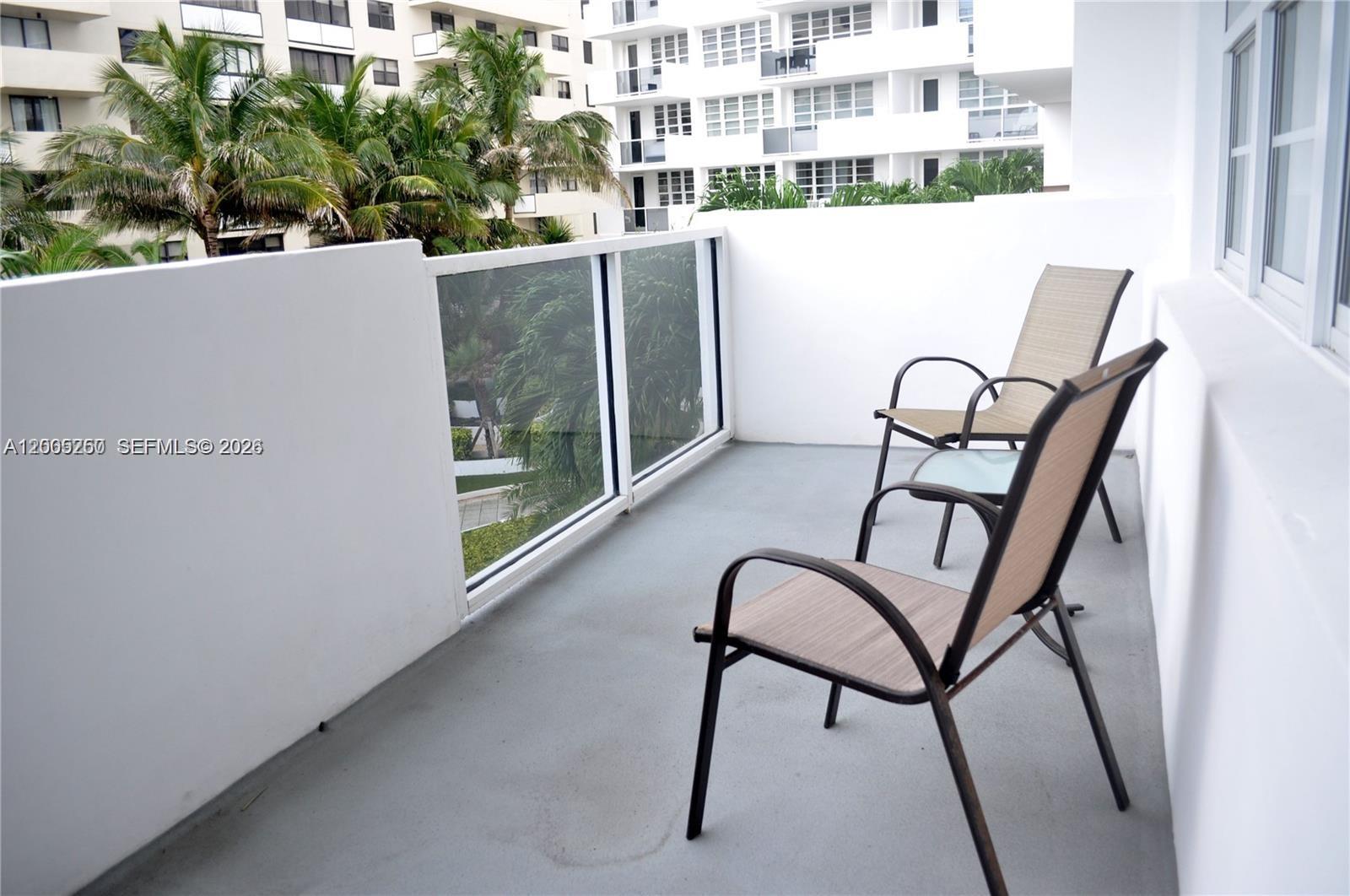 100 Lincoln Road, Unit 534 Miami Beach, FL 33139 - Photo 15 of 15 a view of a balcony with furniture