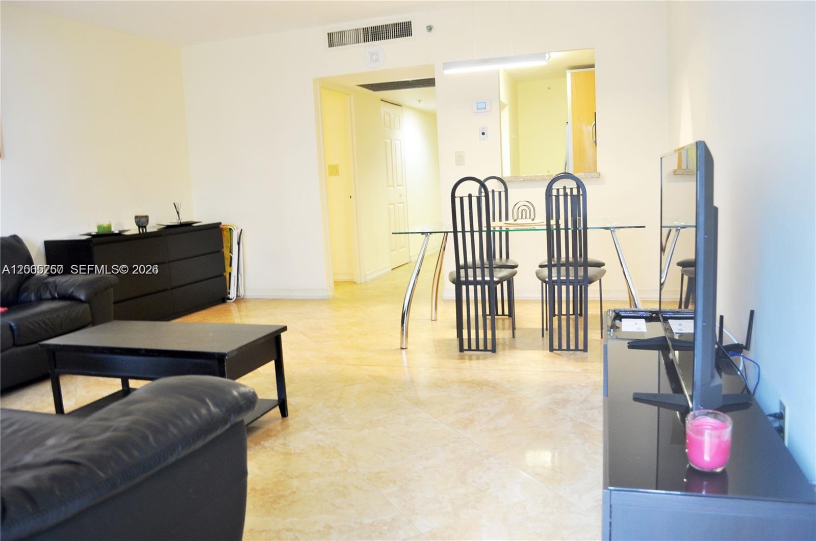 100 Lincoln Road, Unit 534 Miami Beach, FL 33139 - Photo 8 of 15 a living room with furniture