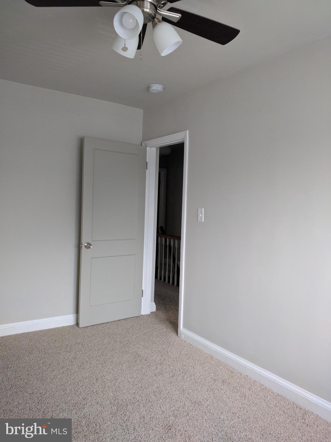 1976 Haselmere Road Dundalk, MD 21222 - Photo 18 of 28 an empty room with a empty space and a window