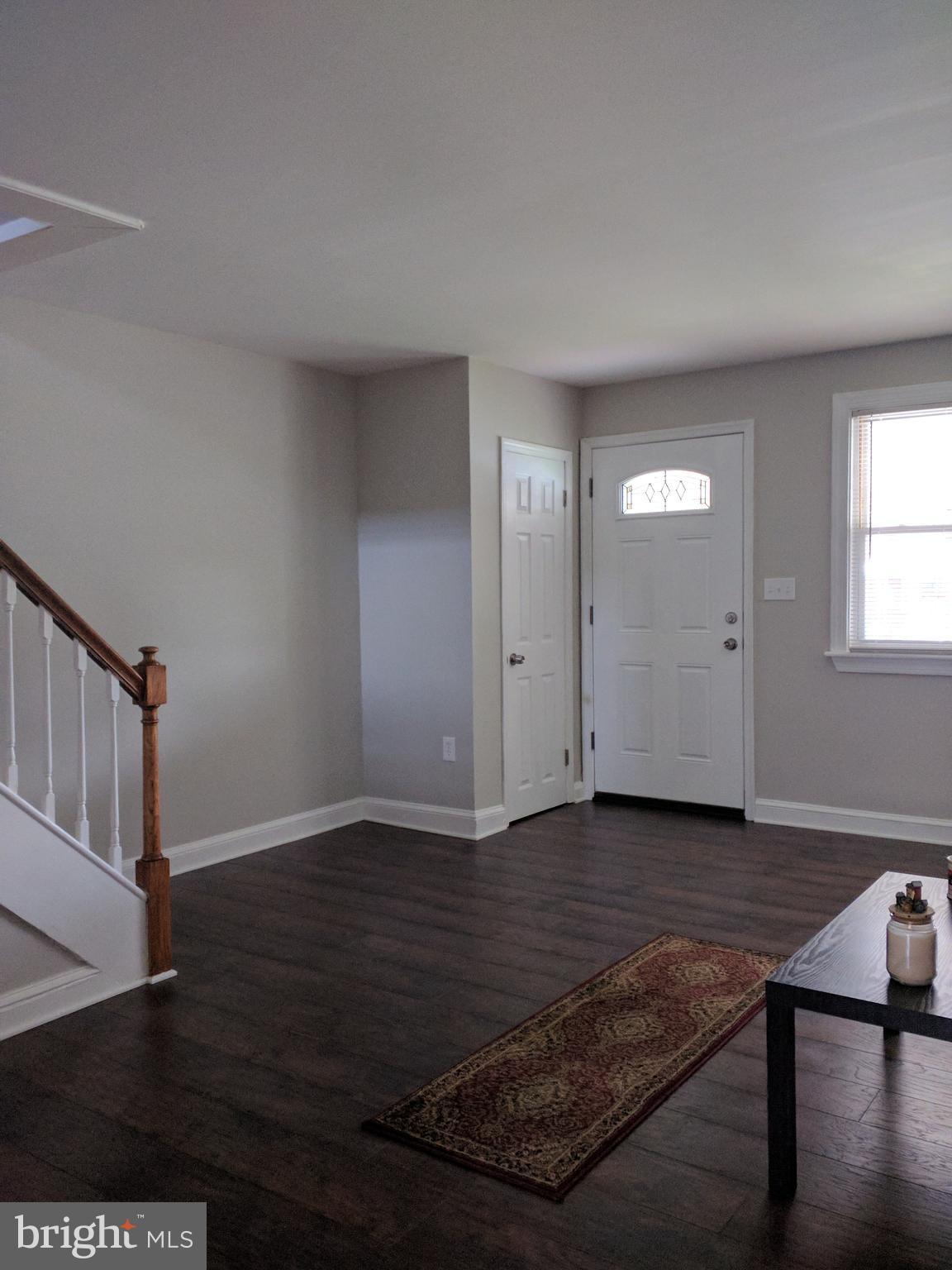 1976 Haselmere Road Dundalk, MD 21222 - Photo 3 of 28 a view of livingroom with hardwood floor and window
