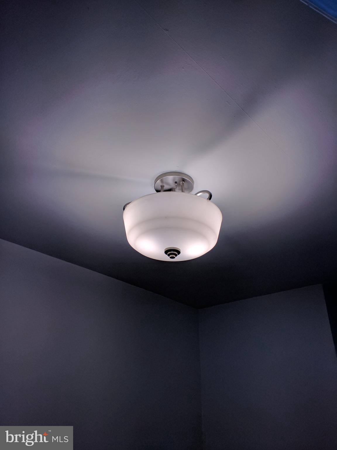 1976 Haselmere Road Dundalk, MD 21222 - Photo 21 of 28 a lamp on a table in a room