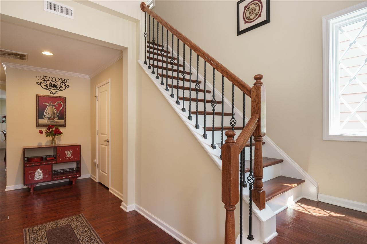 5622 Wade Park Boulevard Raleigh, NC 27607 - Photo 3 of 25 LOVELY FOYER WITH NATURAL STOPPING POINT TO GIVE PRIVACY TO THE LIVING AREA OF THIS WELL APPOINTED HOME! FOYER
