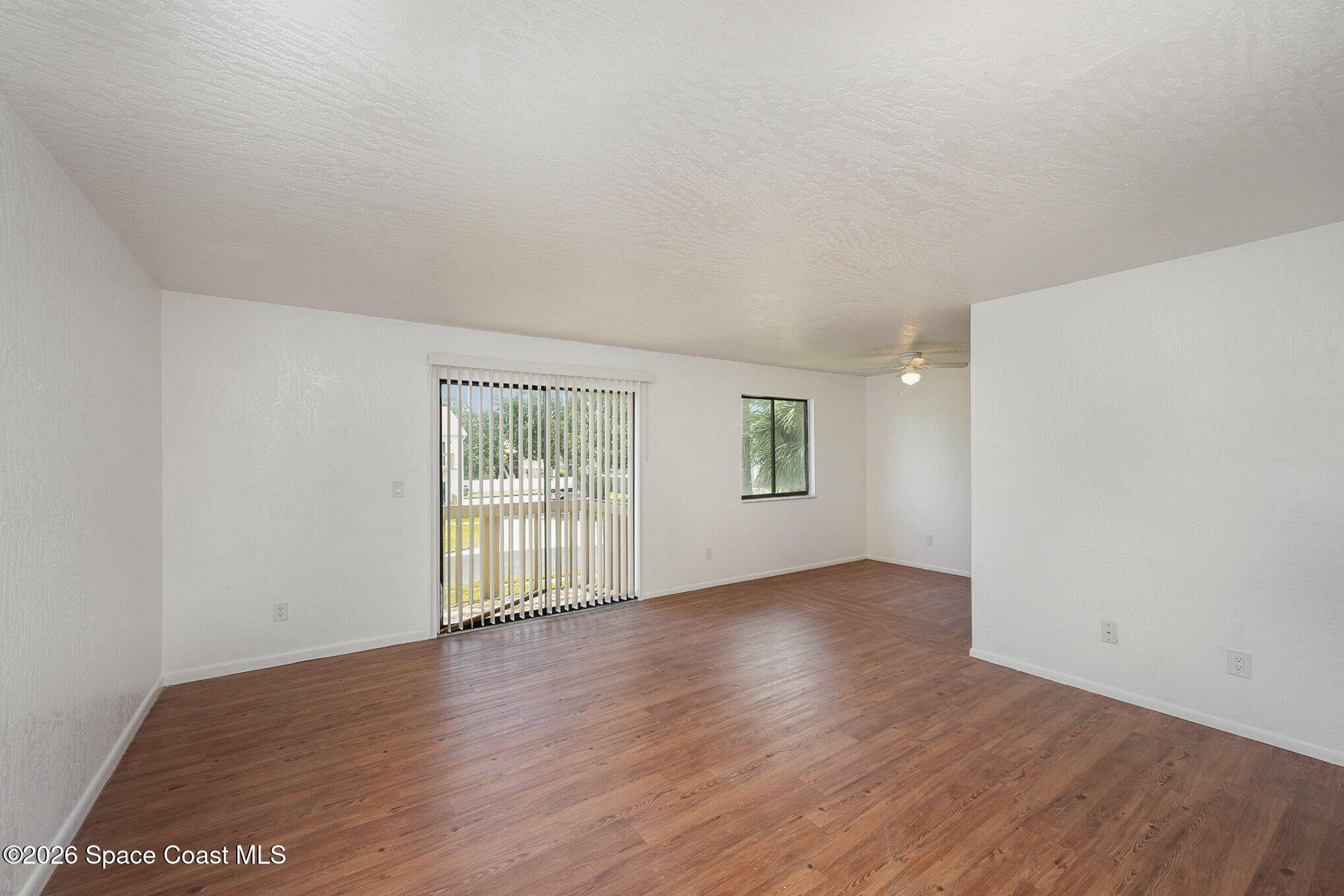 2612 Tree Ridge Lane Northeast Palm Bay, FL 32905 - Photo 2 of 18 Living-Dining