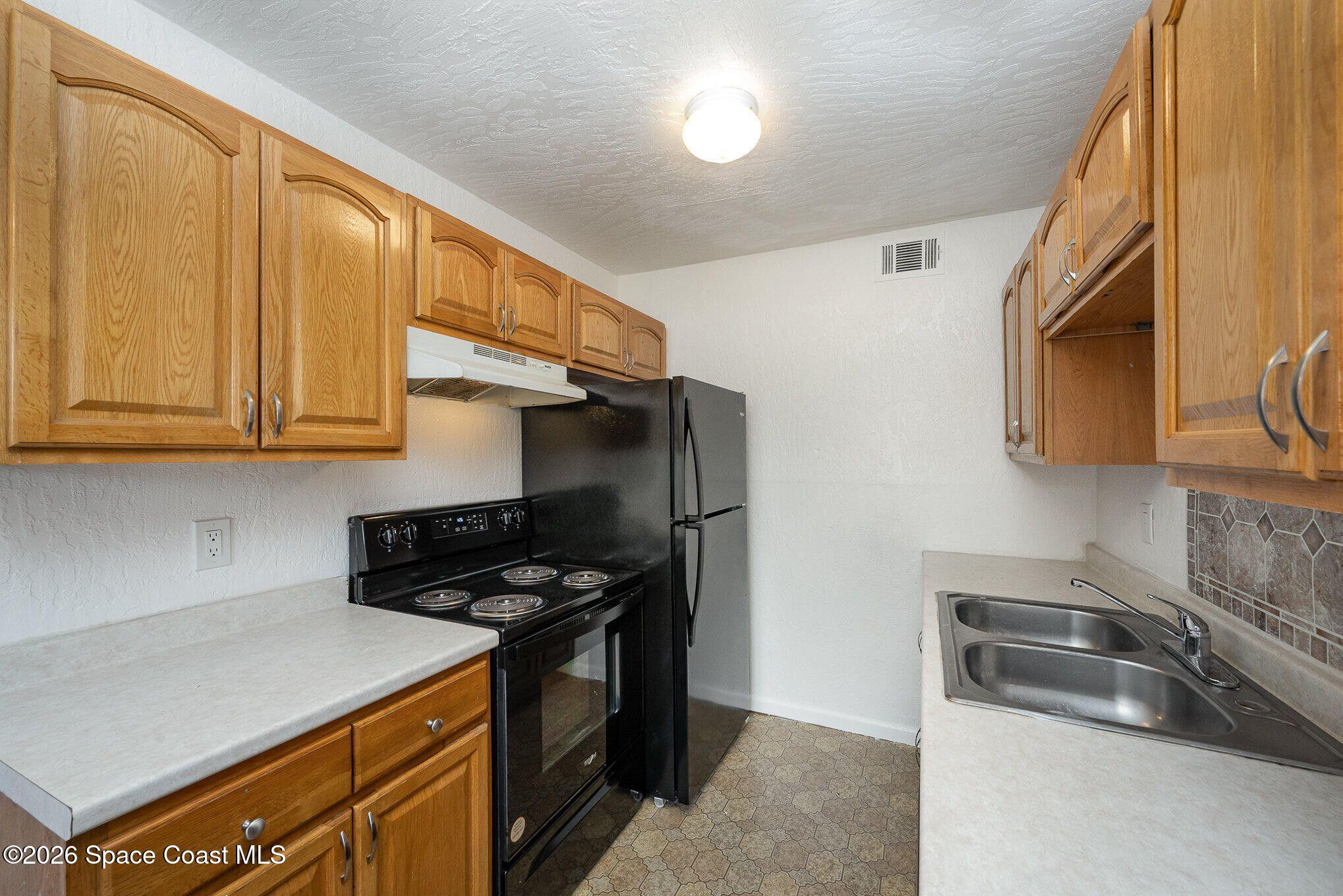 2612 Tree Ridge Lane Northeast Palm Bay, FL 32905 - Photo 5 of 18 Kitchen