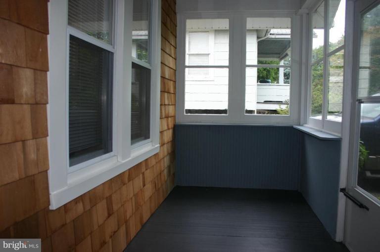 911 Overbrook Road Baltimore, MD 21239 - Photo 18 of 20 Enclosed Front Porch