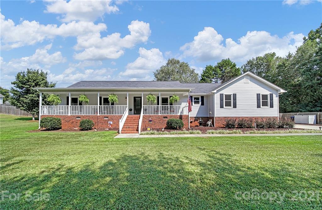 8999 West Meadow Ridge Road Indian Land, SC 29707 - Photo 1 of 28 a view of a house with a yard and porch