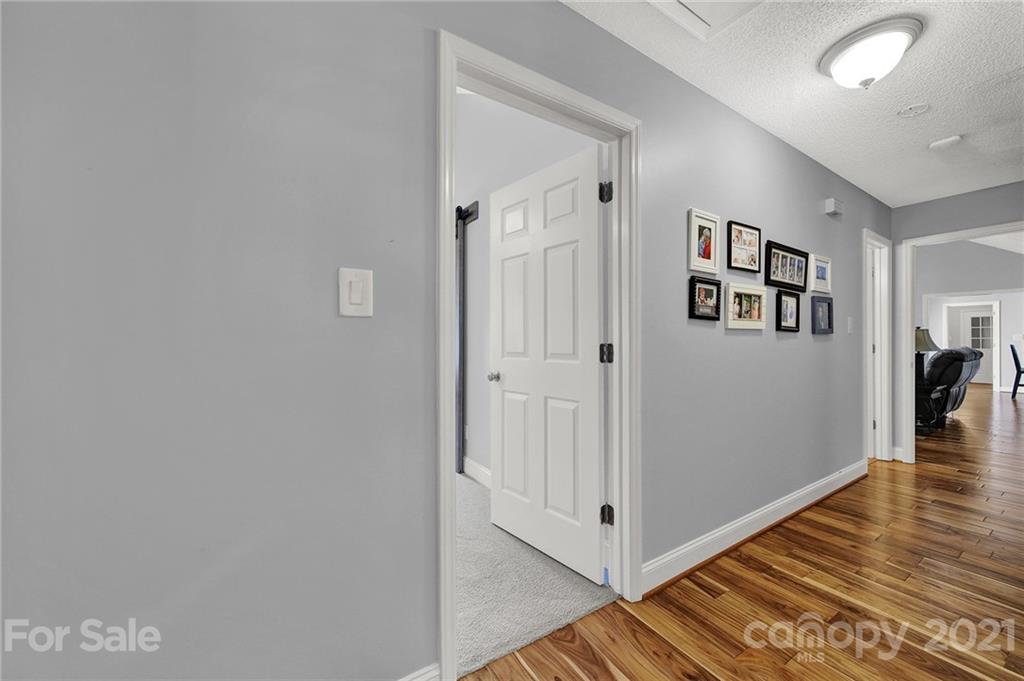 8999 West Meadow Ridge Road Indian Land, SC 29707 - Photo 14 of 28 a view of a hallway with interior of the house