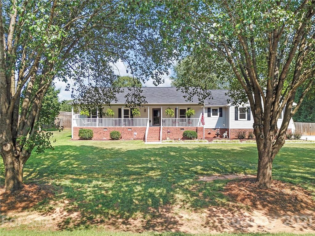 8999 West Meadow Ridge Road Indian Land, SC 29707 - Photo 26 of 28 a front view of a house with a yard