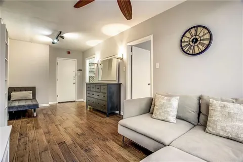 a room with a dresser and a mirror