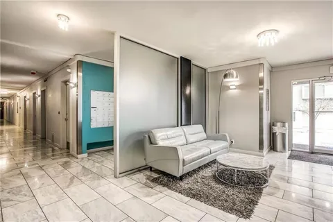 a view of a livingroom with wooden floor
