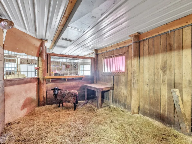 a view of a room with wooden racks