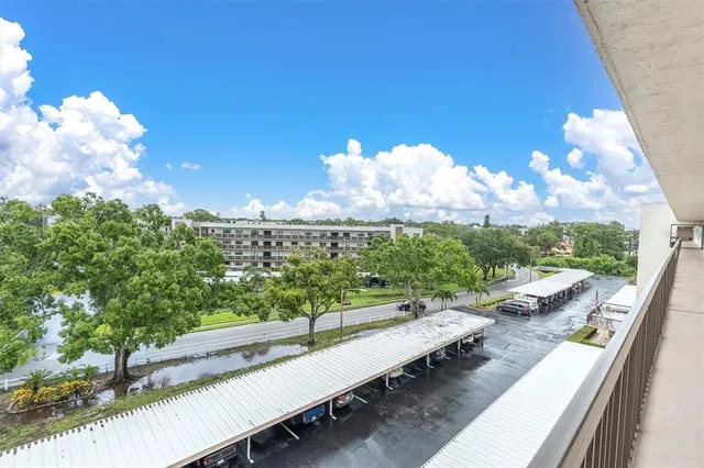 a view of a chairs and table on the terrace