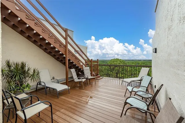 a view of a swimming pool with a lounge chair
