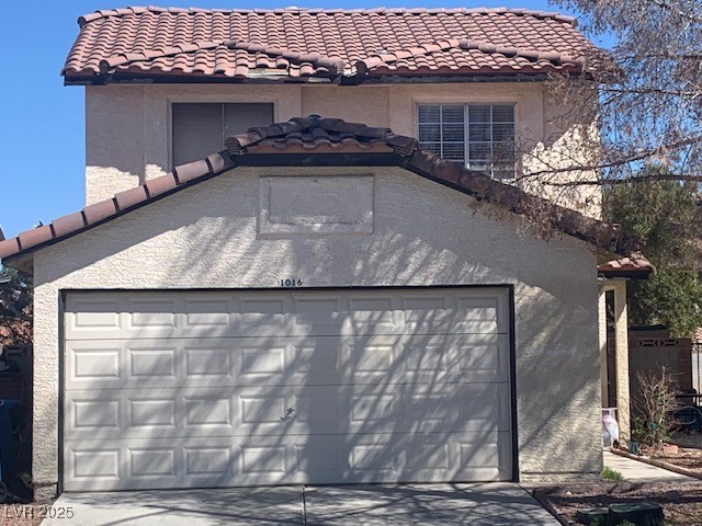 1016 Vantage Point Road Las Vegas, NV 89128 - Photo 1 of 18 Garage featuring driveway