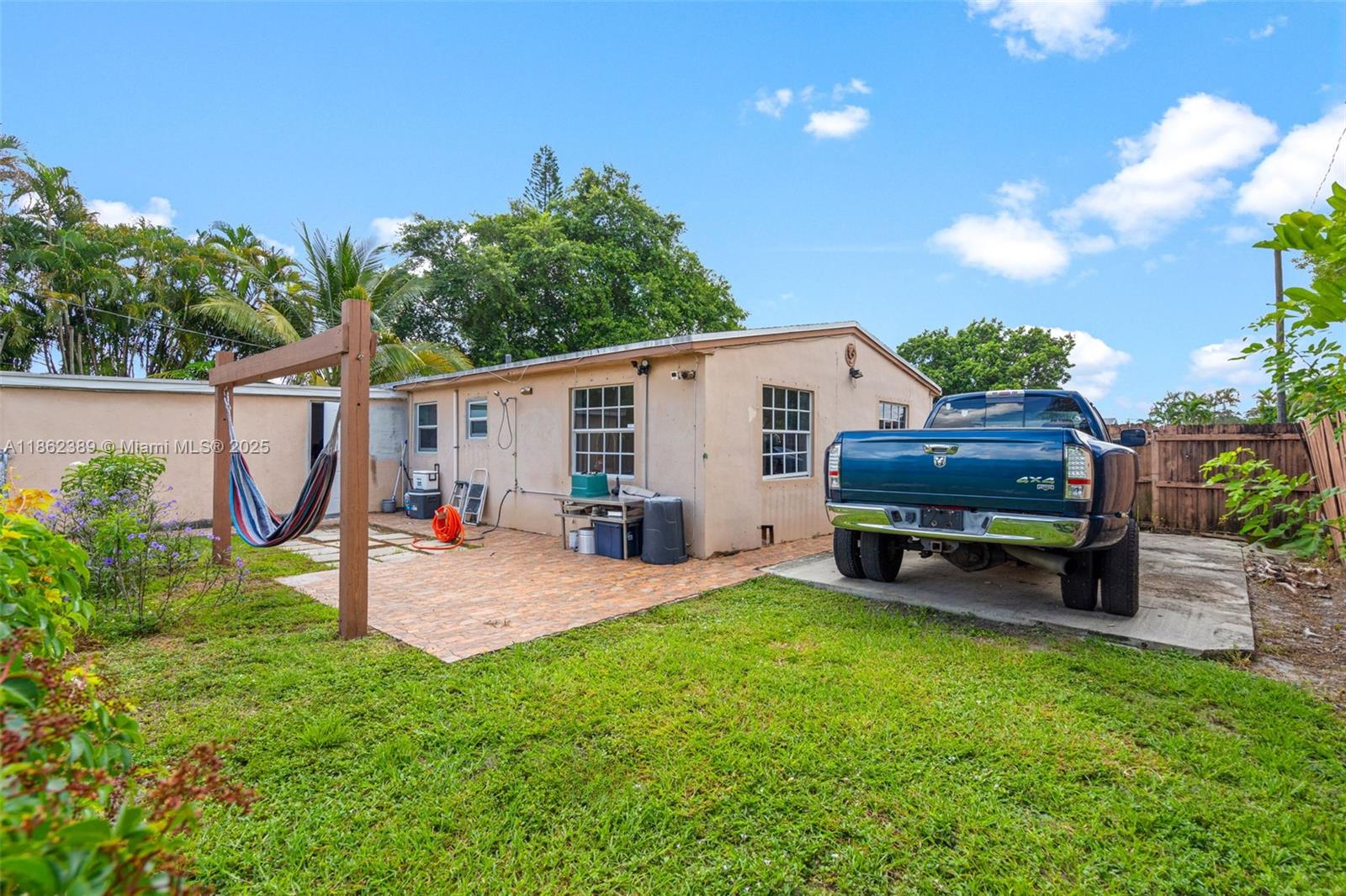 6233 Rodman Street Hollywood, FL 33023 - Photo 35 of 39 a backyard of a house with seating space