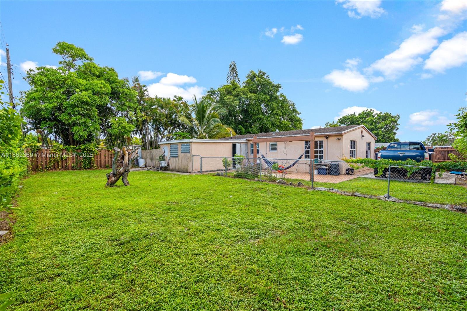 6233 Rodman Street Hollywood, FL 33023 - Photo 36 of 39 a view of a house with a backyard