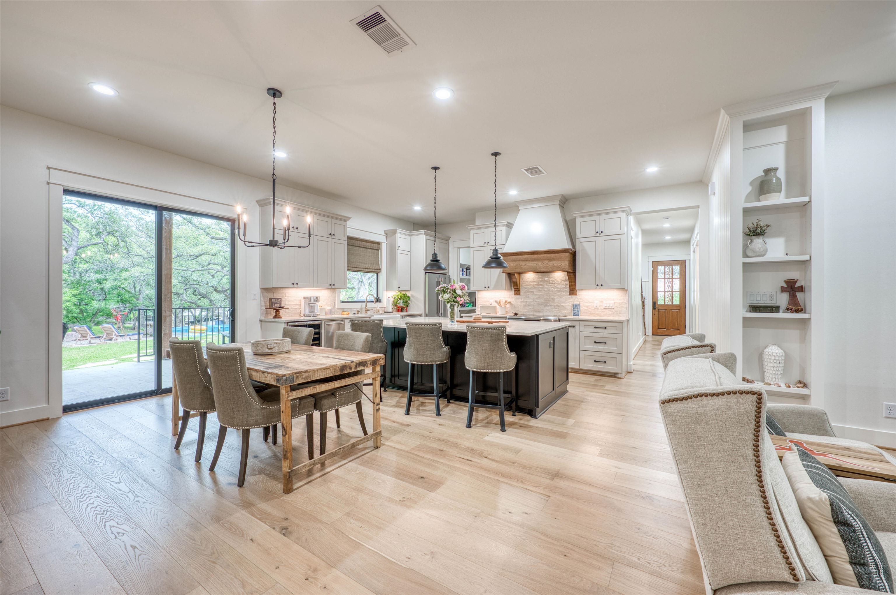 2001 Granite Cove Road Kingsland, TX 78639 - Photo 12 of 42 a large kitchen with a table and chairs
