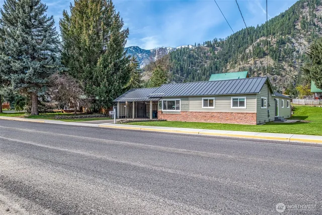 a house with trees in the background