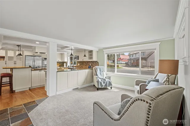 a living room with furniture and a table